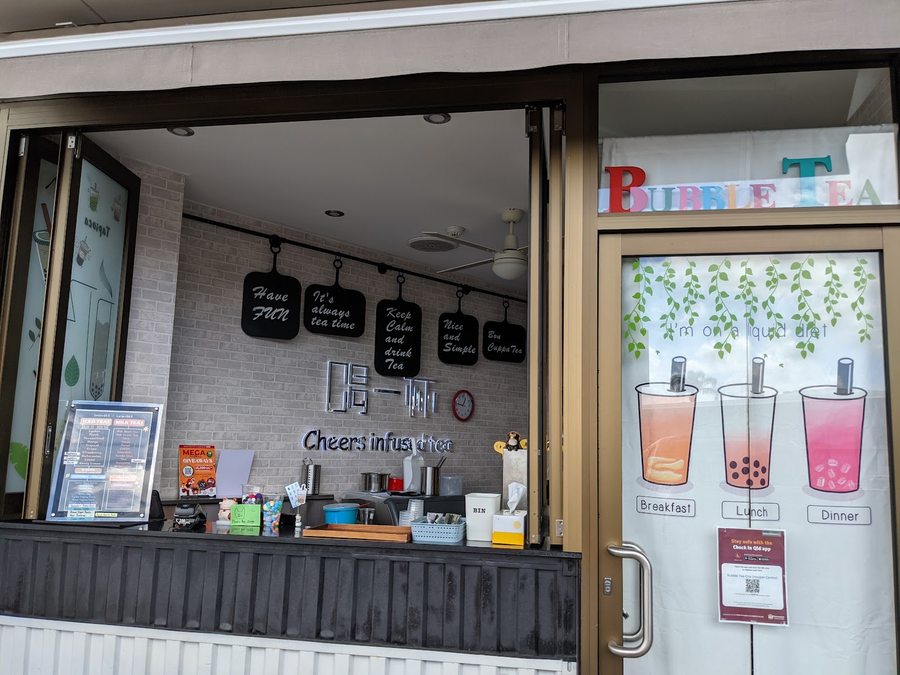 Inside Bubble Tea City: the service counter and menu board