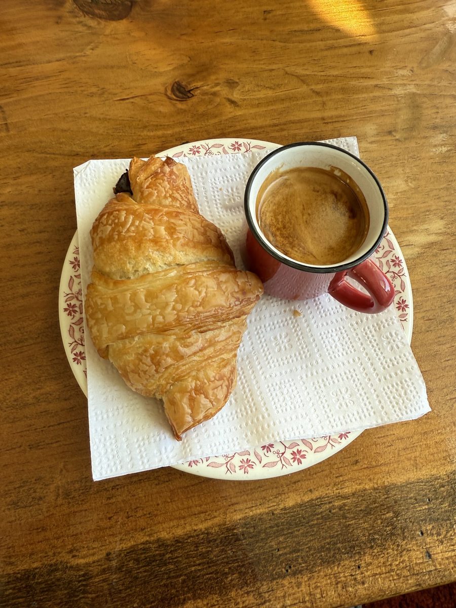 A fresh croissant with an espresso at Le French Fix