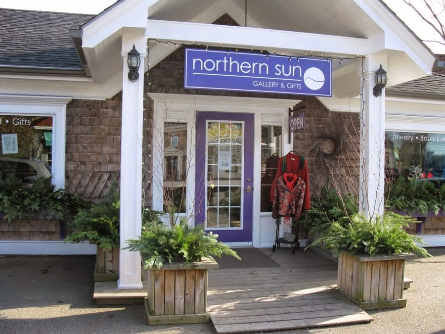 The purple storefront of Northern Sun Gallery & Gifts at 8 Edgewater Street, Mahone Bay