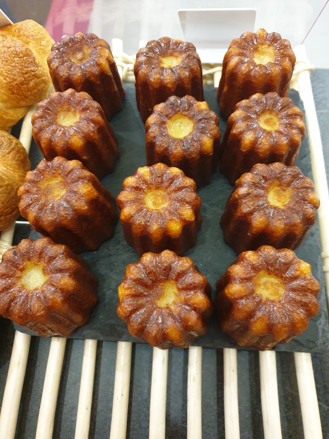 Close-up of freshly baked canelés