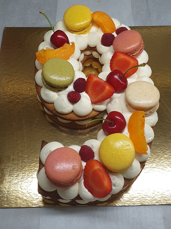 Custom number-shaped celebration cake