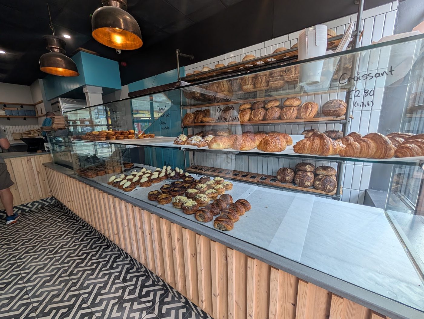 Dún Artisan Bakery pastry counter with croissants and sourdough