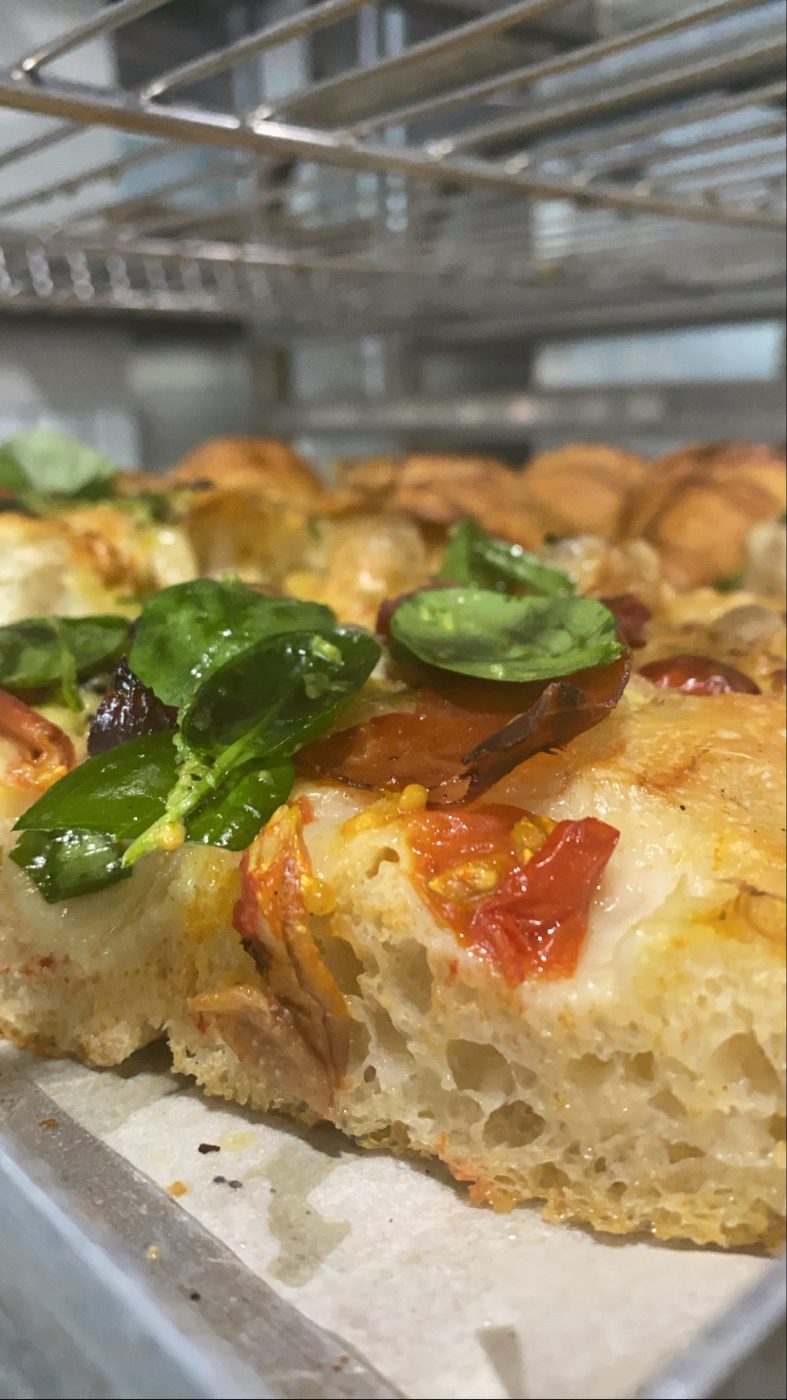 Tomato and basil focaccia, fresh from the bakery