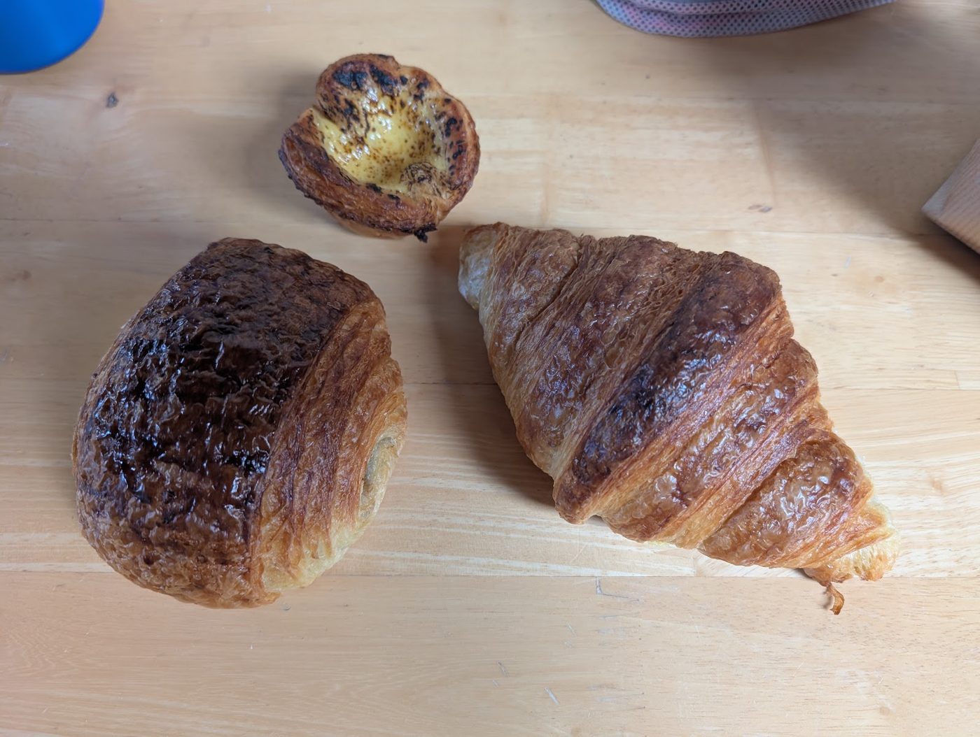 Croissant, pain au chocolat and custard tart