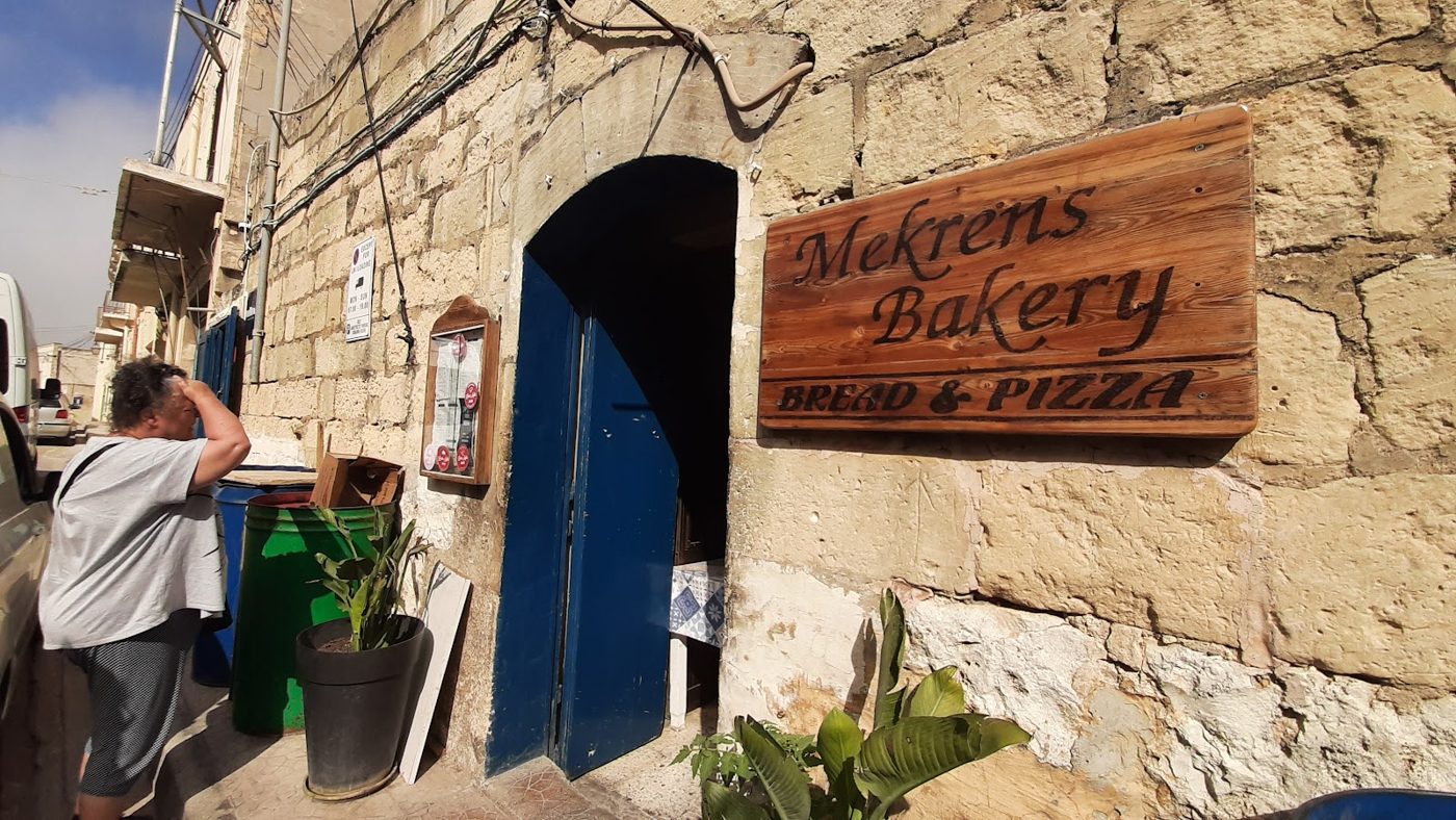 The Mekren's Bakery storefront sign in Nadur