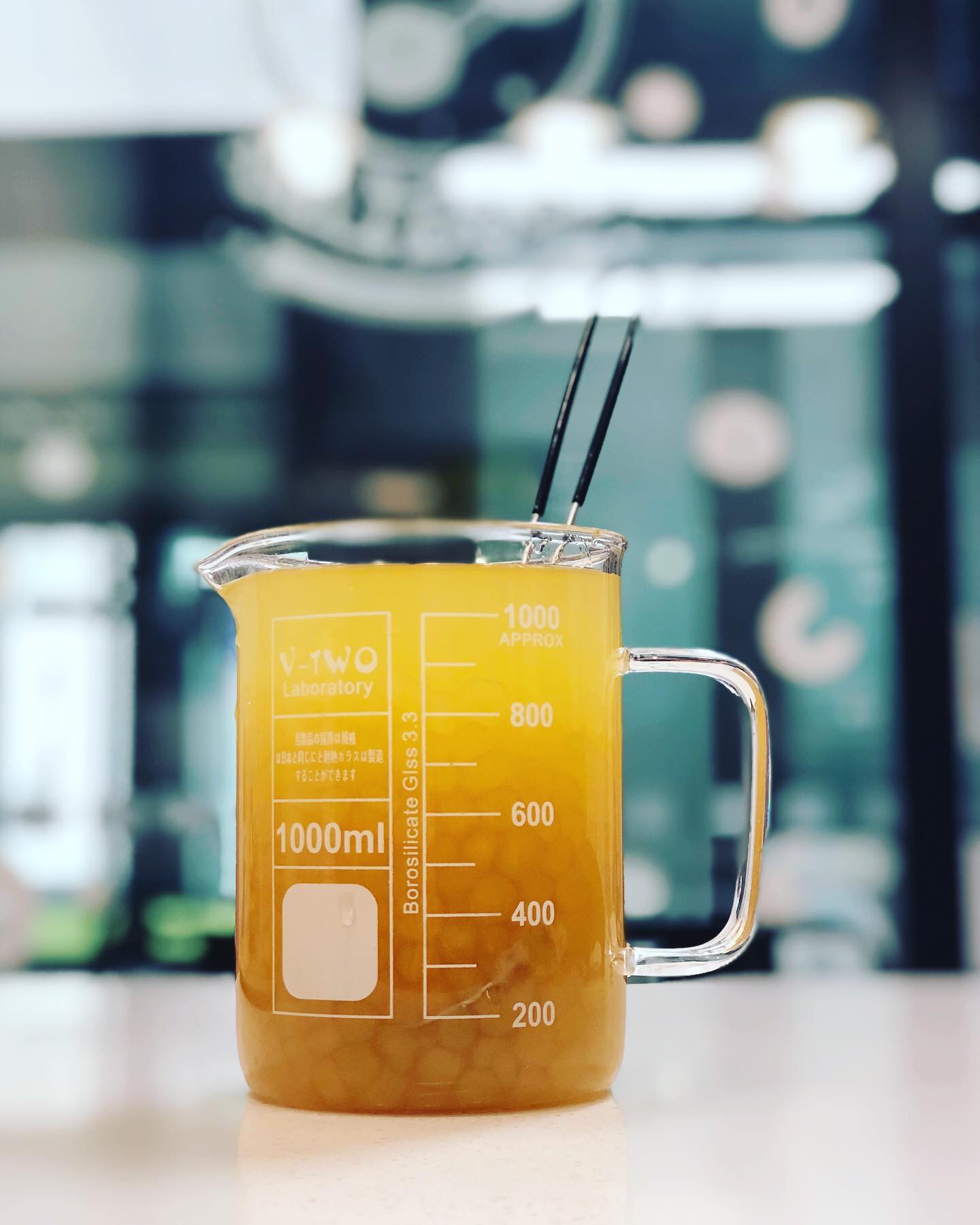 BobaLab's signature drink served in a 1000ml laboratory beaker.