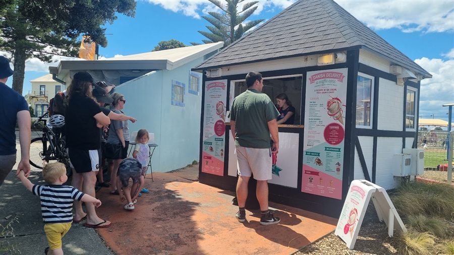 Families queued at the Danish Delight window on Marine Parade