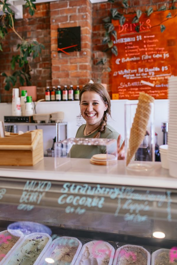Frosty Moons staff behind the counter, ready to scoop