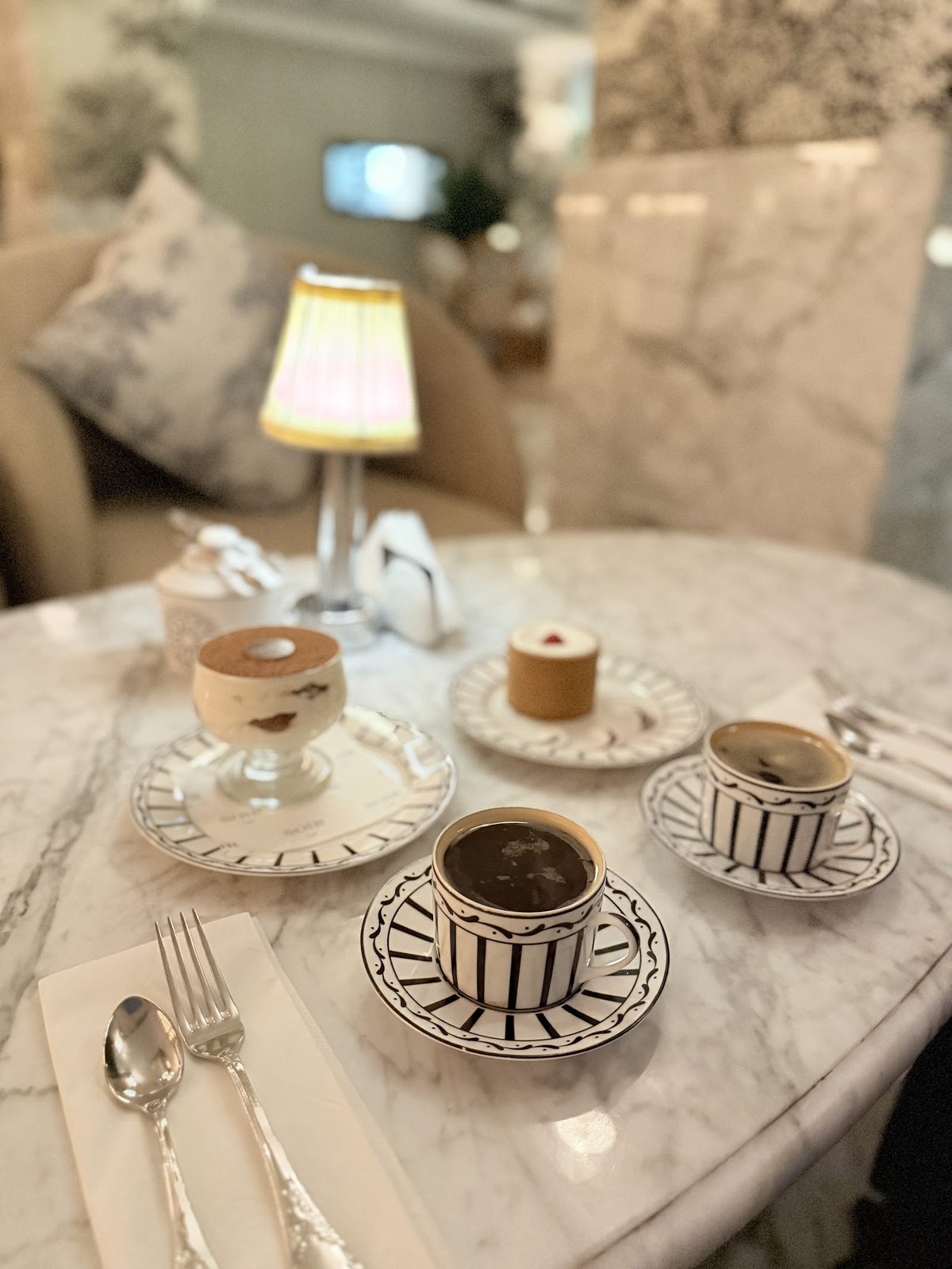 The candlelit interior of SOIR CAFÉ