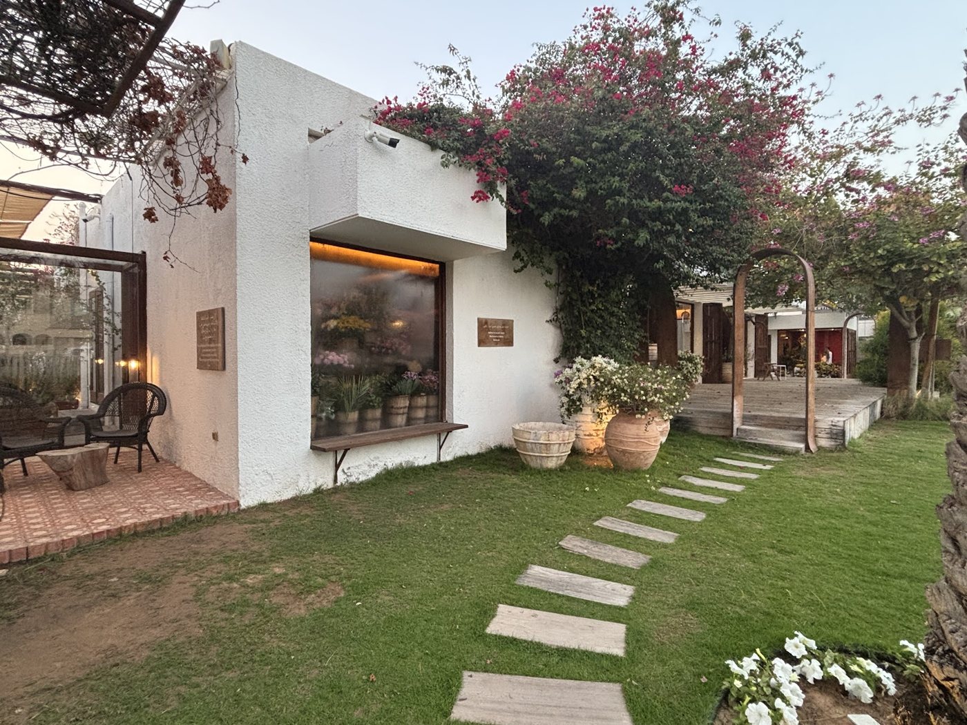 The villa-style garden exterior of Oath Cafe in Jumeirah