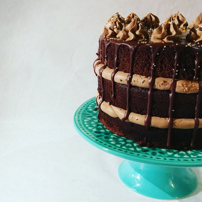 Chocolate and caramel drip layer cake