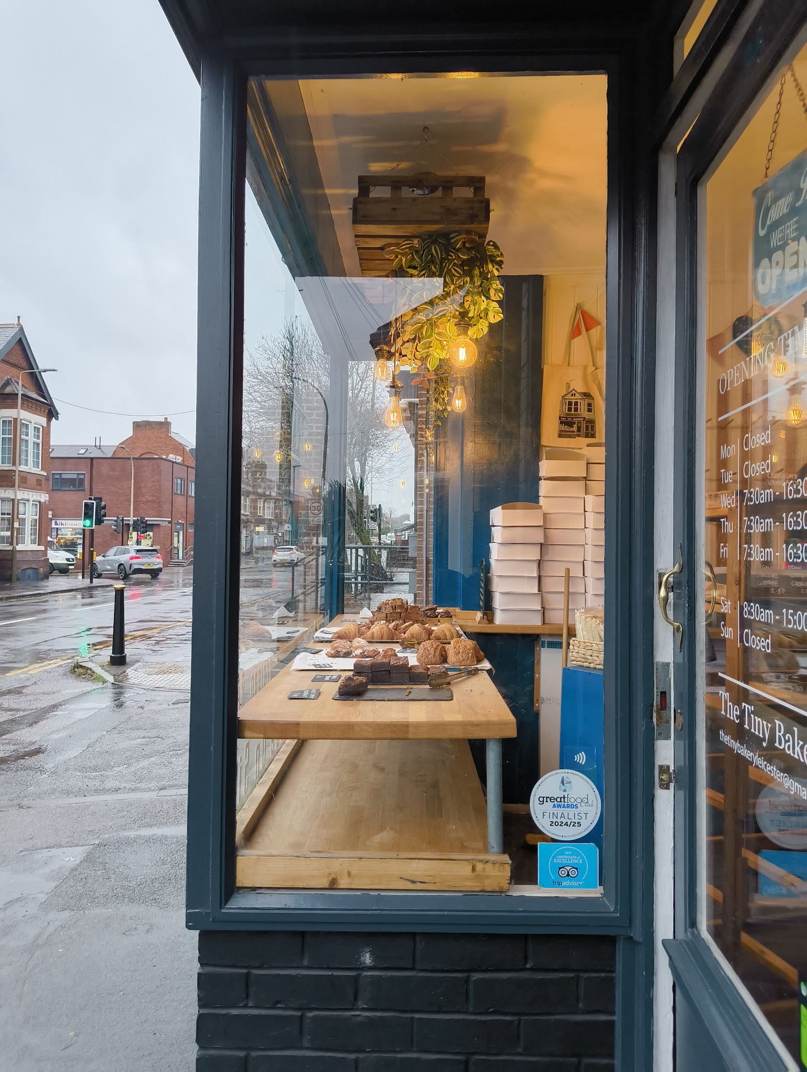 The Tiny Bakery's navy shopfront on Clarendon Park Road, Leicester
