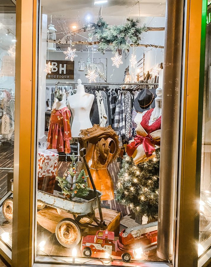 Brave Hazel Boutique storefront window display on Carlinville's town square