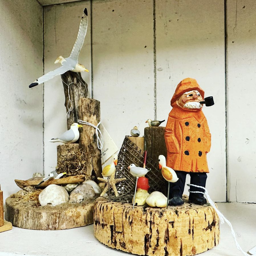 A hand-carved folk-art figurine scene