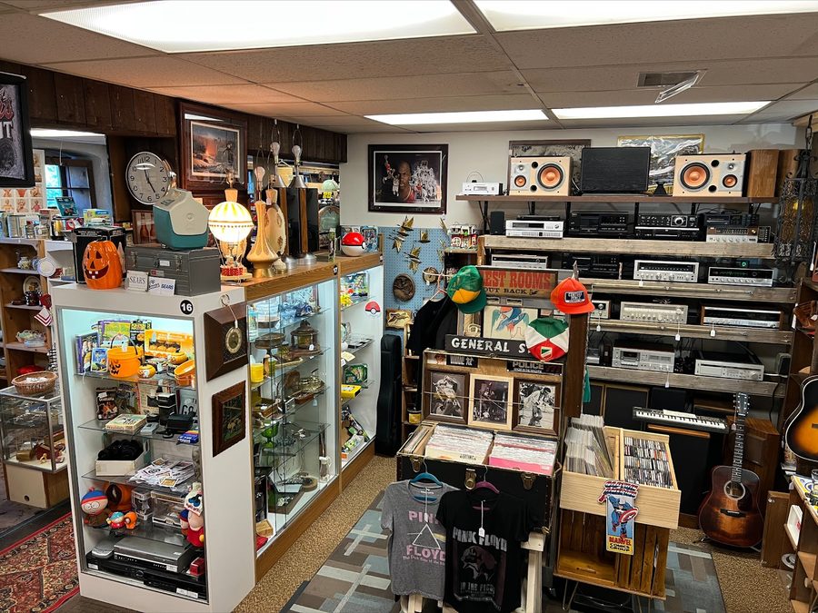 The second floor, with vinyl records, electronics and guitars