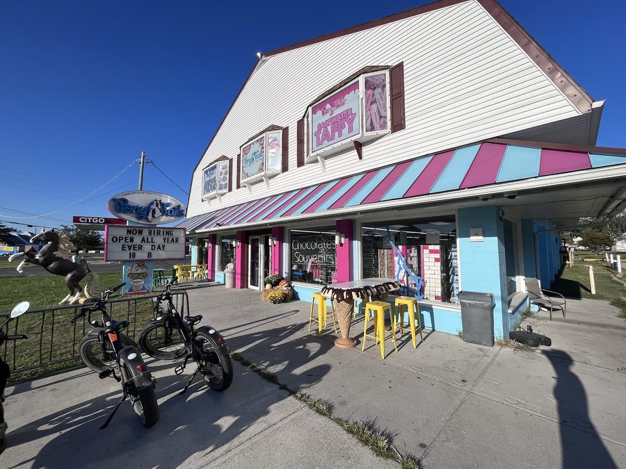 Pony Tails storefront with its Saltwater Taffy signage and candy-stripe awning