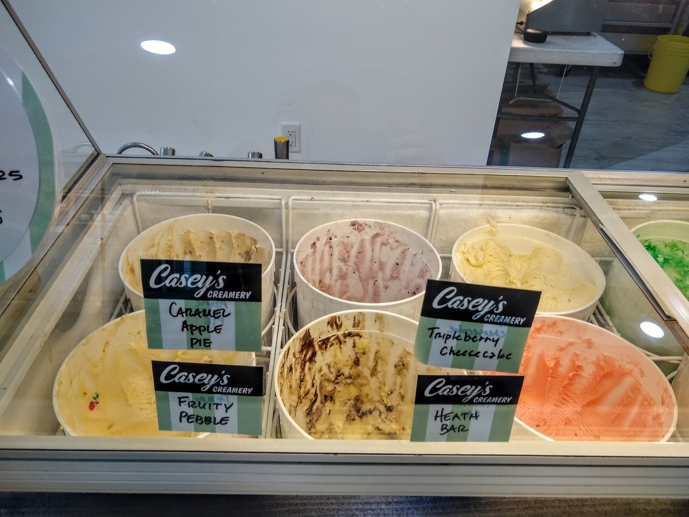 Casey's Creamery dipping cabinet with hand-labeled ice cream flavors