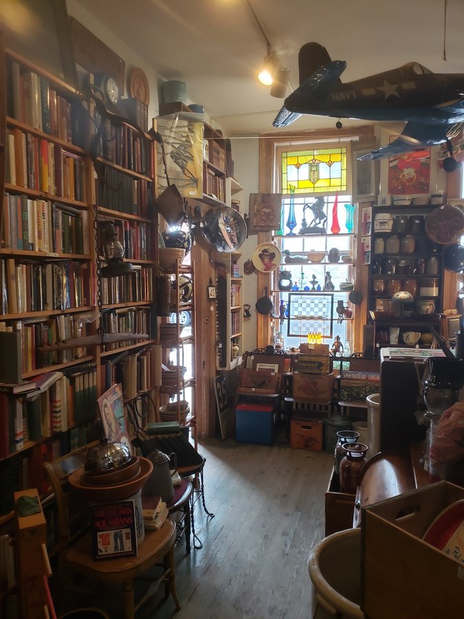 Floor-to-ceiling bookshelves, a stained-glass window and curiosities inside Peace of the Past