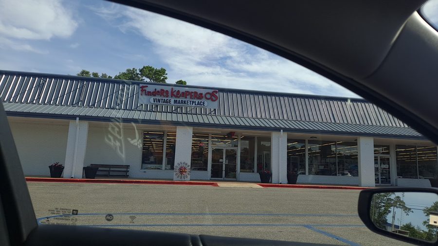 The Finders Keepers OS storefront with its hand-lettered vintage marketplace sign