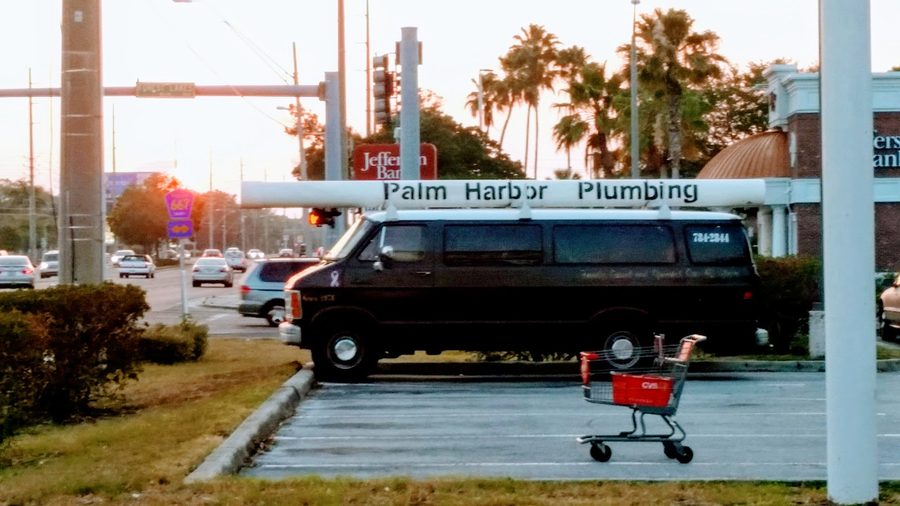 Palm Harbor Plumbing company van with signage