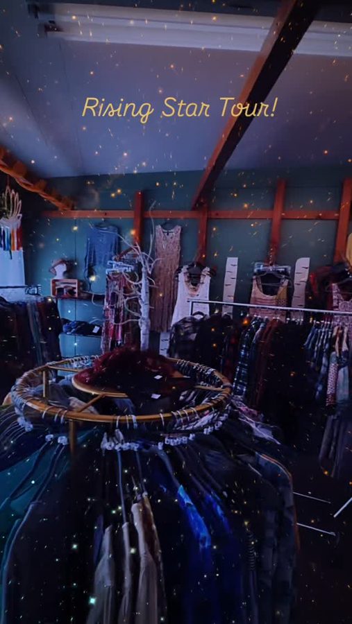 Inside Rising Star Boutique — a bright, welcoming interior with clothing racks and gift displays