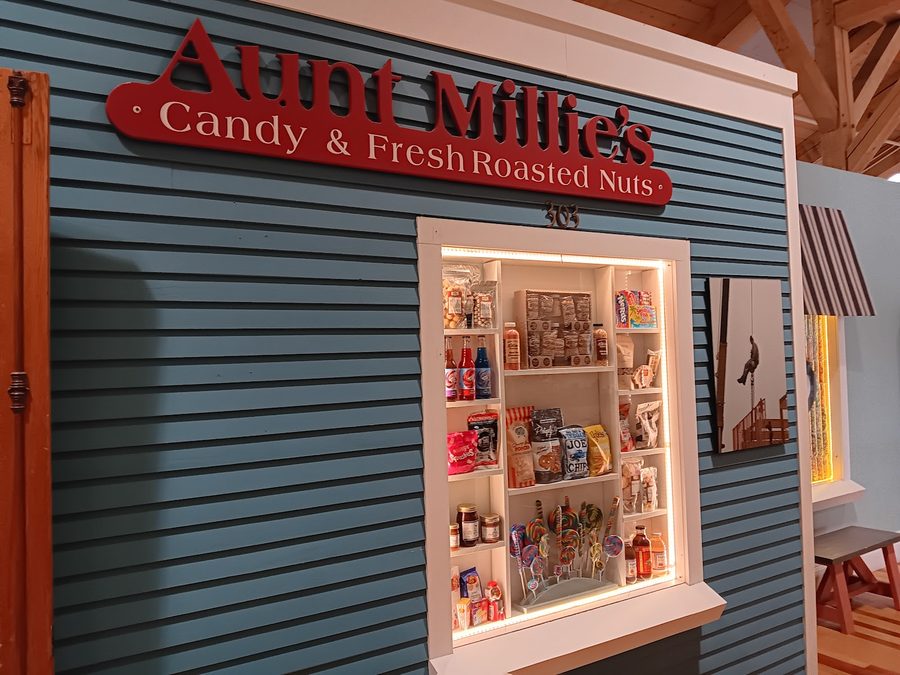 Aunt Millie's Candy & Fresh Roasted Nuts storefront sign inside Davis Mercantile